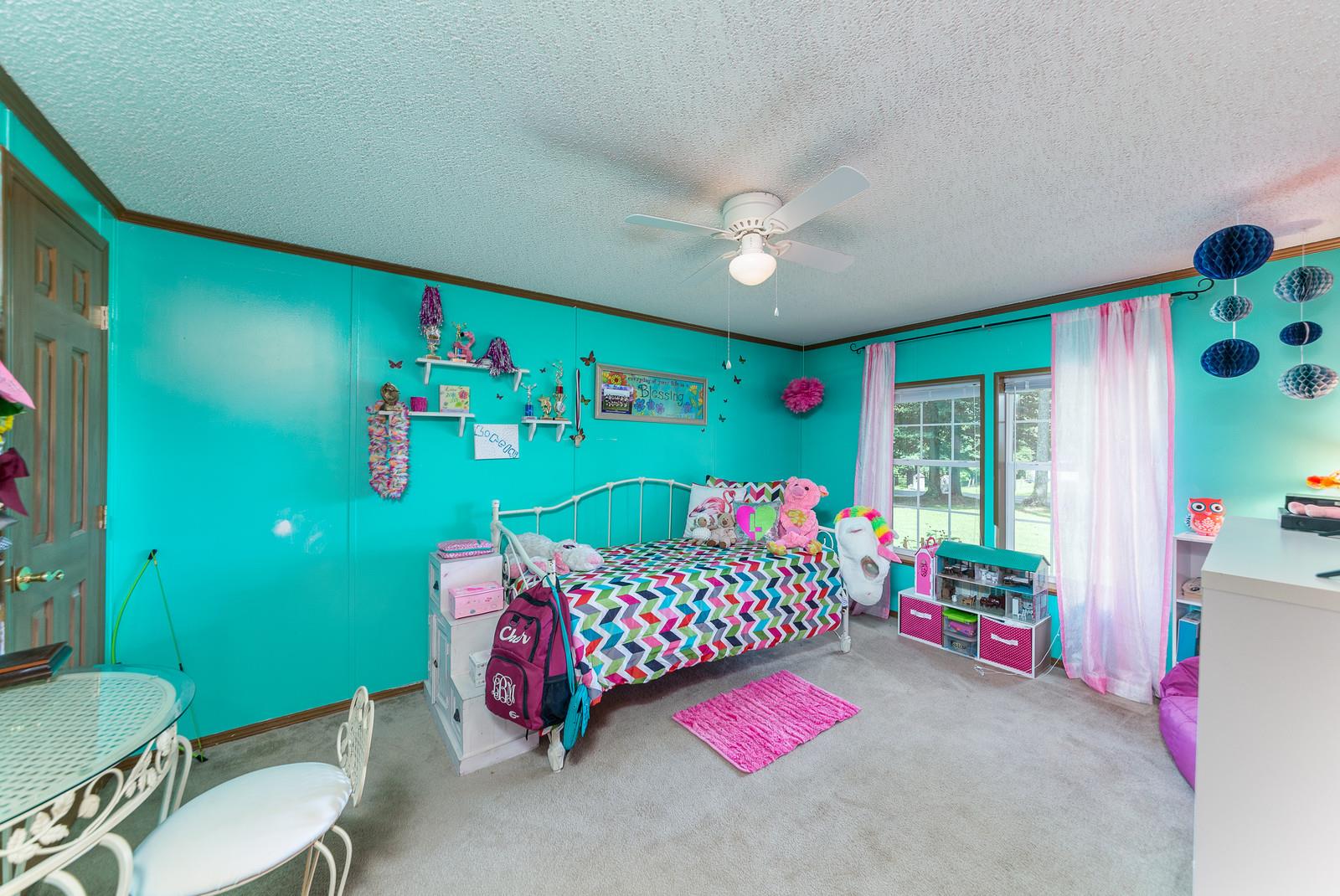 6345 Roy Pearson Road Springfield, TN 37172 - Photo 20 of 30 a bedroom with bed and a window