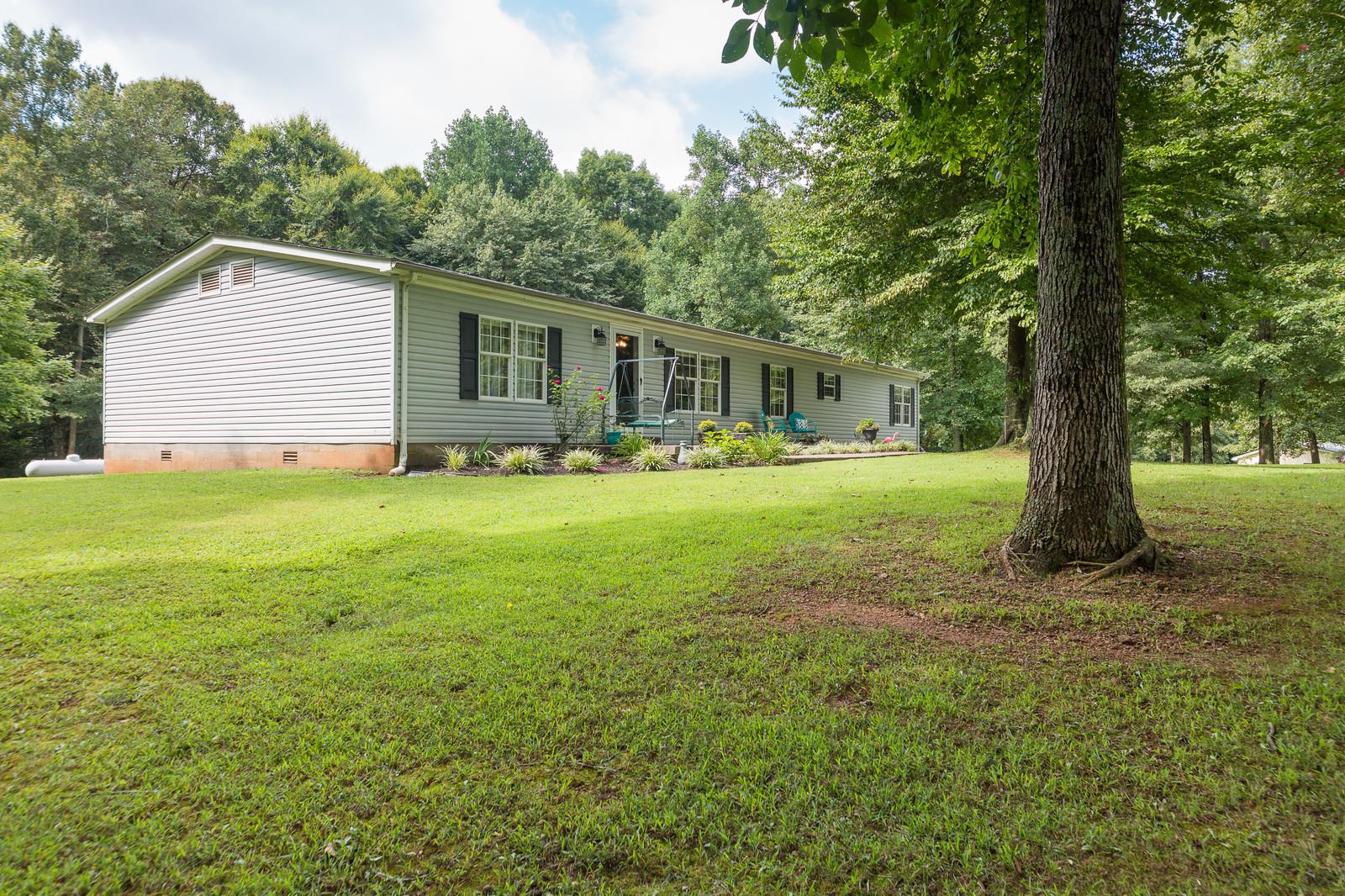 6345 Roy Pearson Road Springfield, TN 37172 - Photo 26 of 30 a view of a house with a yard