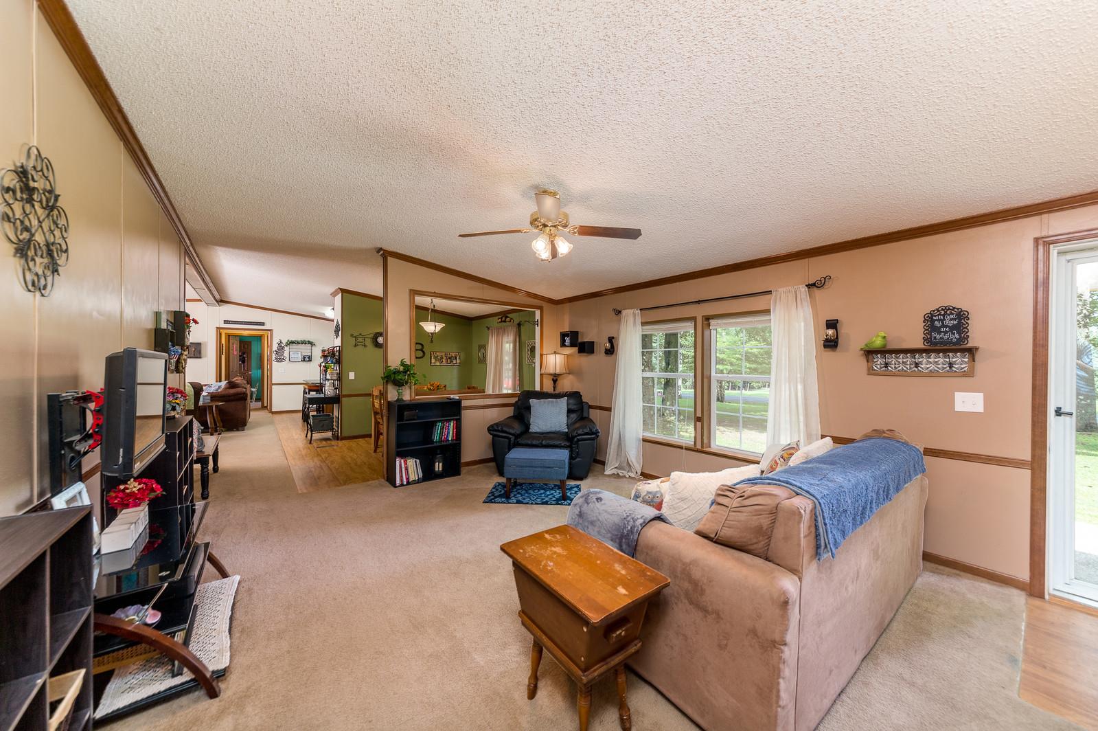 6345 Roy Pearson Road Springfield, TN 37172 - Photo 5 of 30 a living room with furniture and a large window
