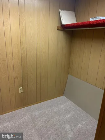 a view of a room with racks on the wall