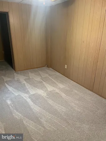 a view of wooden floor and closet