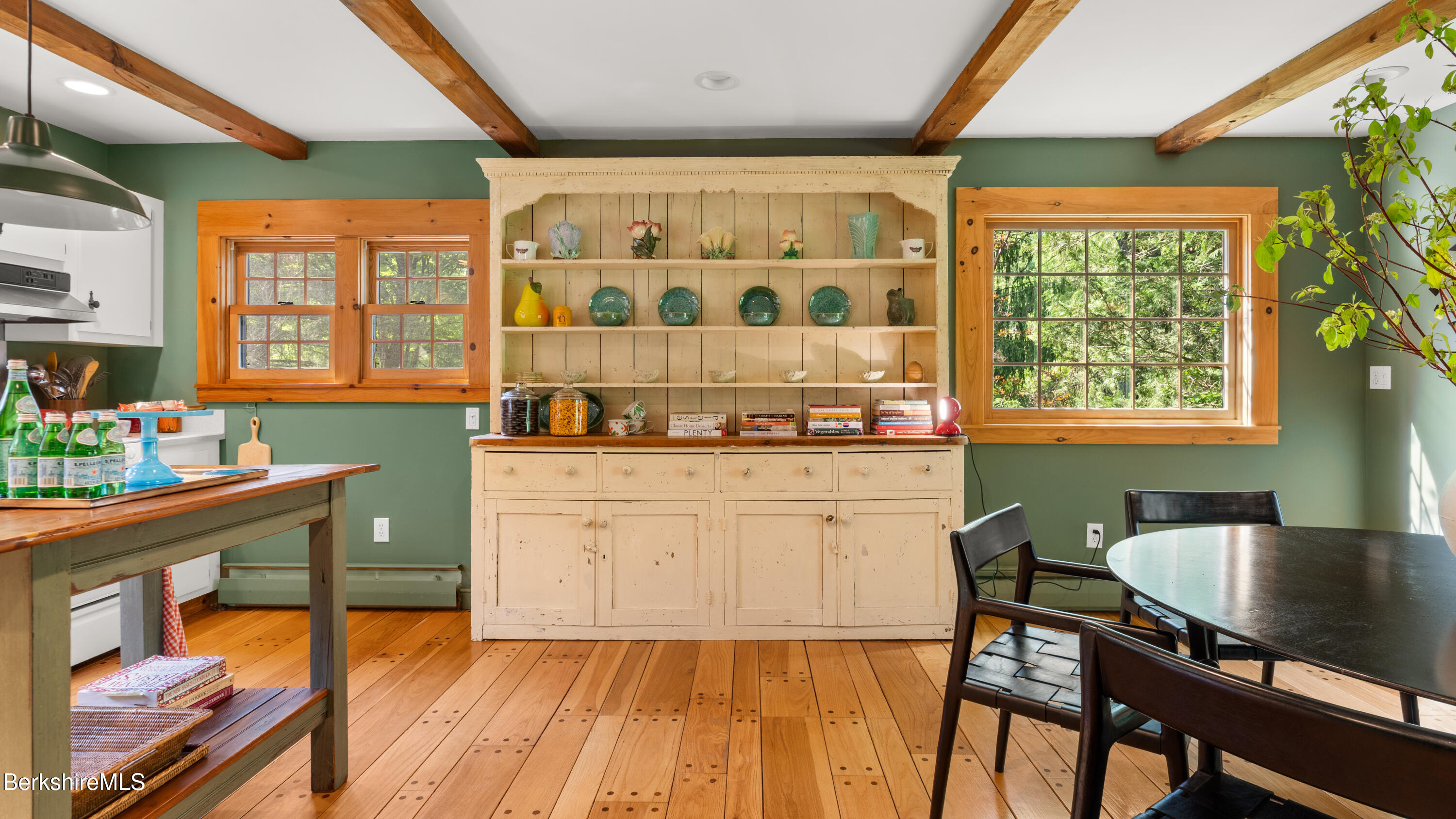 137 E Road Alford, MA 01266 - Photo 14 of 32 a kitchen with a table chairs sink and cabinets