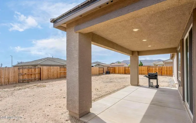 a view of a hallway with a outdoor space
