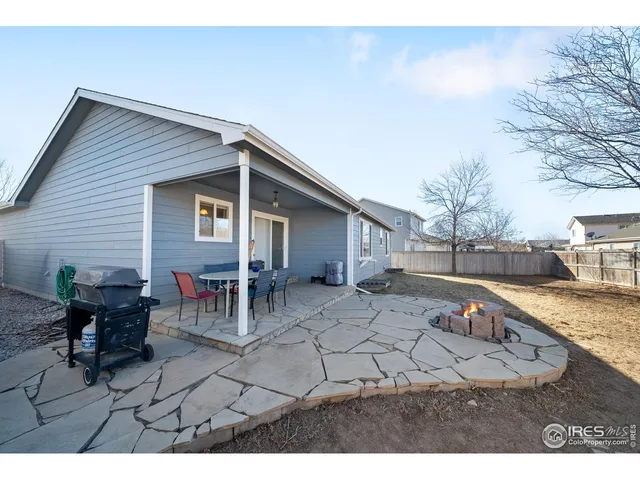 a view of house with yard