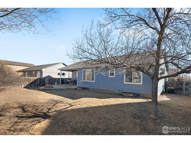 a view of a house with a sink and yard