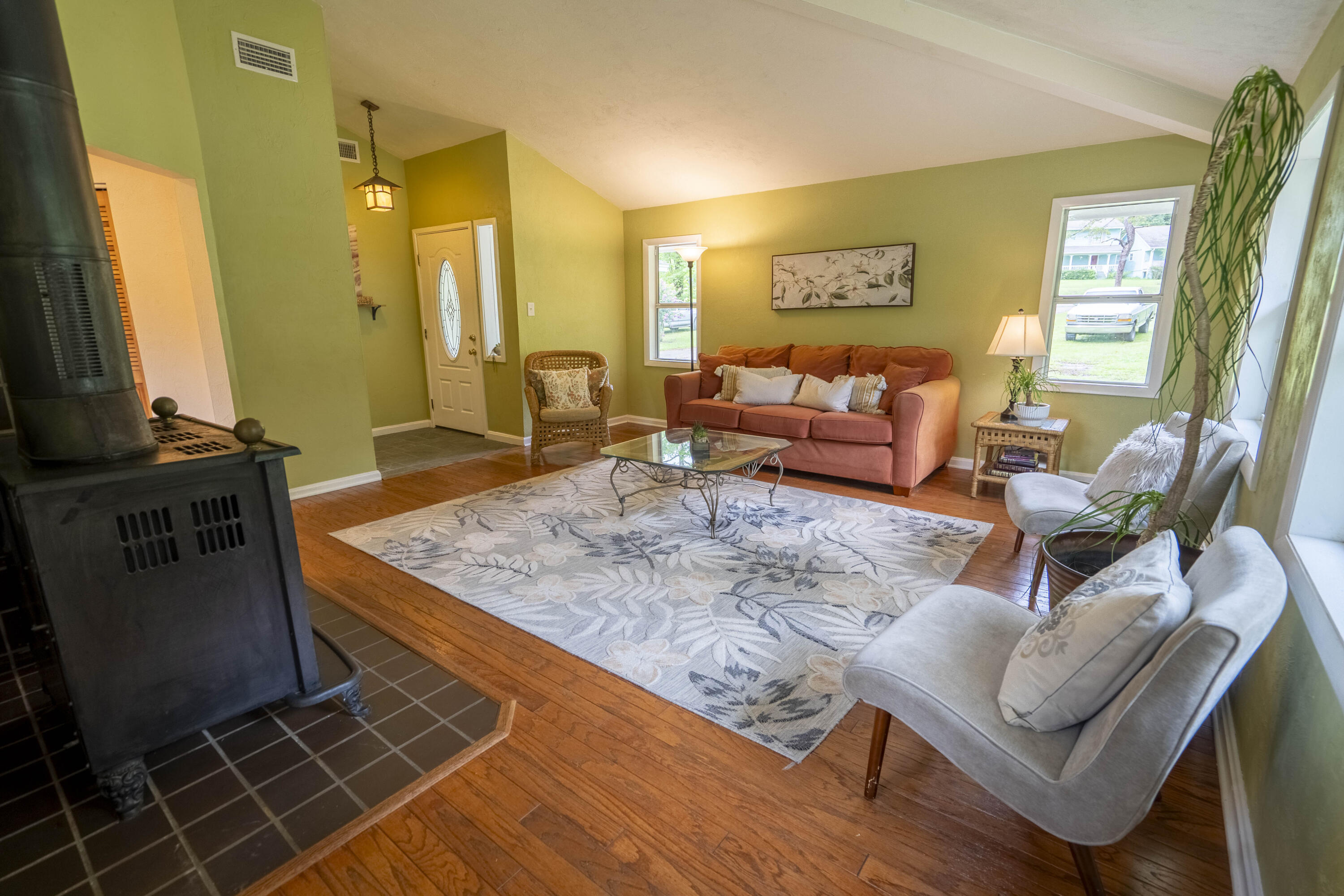 6611 Crooked Creek Road Tallahassee, FL 32311 - Photo 12 of 50 a living room with furniture and a flat screen tv