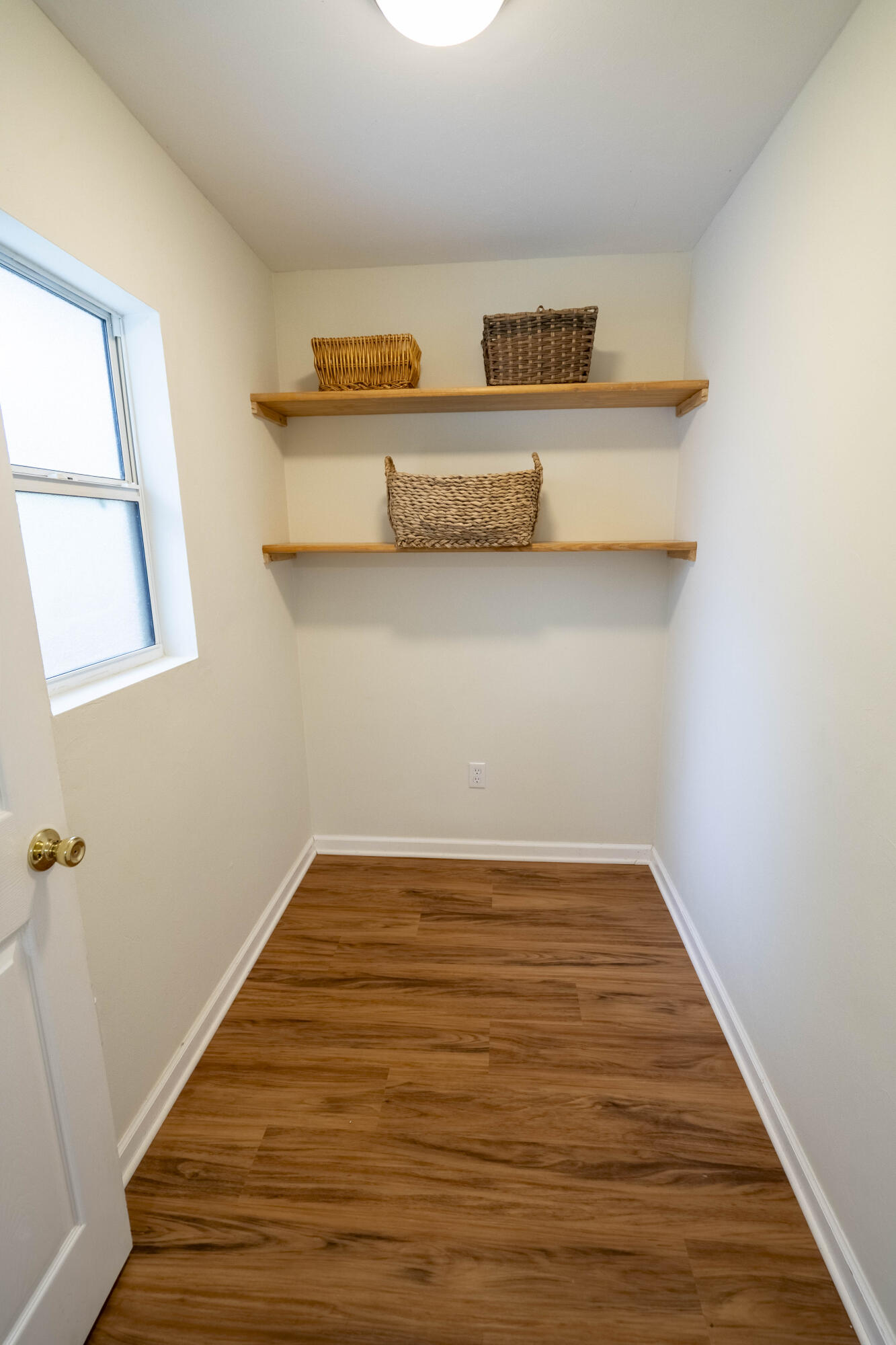 6611 Crooked Creek Road Tallahassee, FL 32311 - Photo 20 of 50 a view of kitchen cabinets and wooden floor