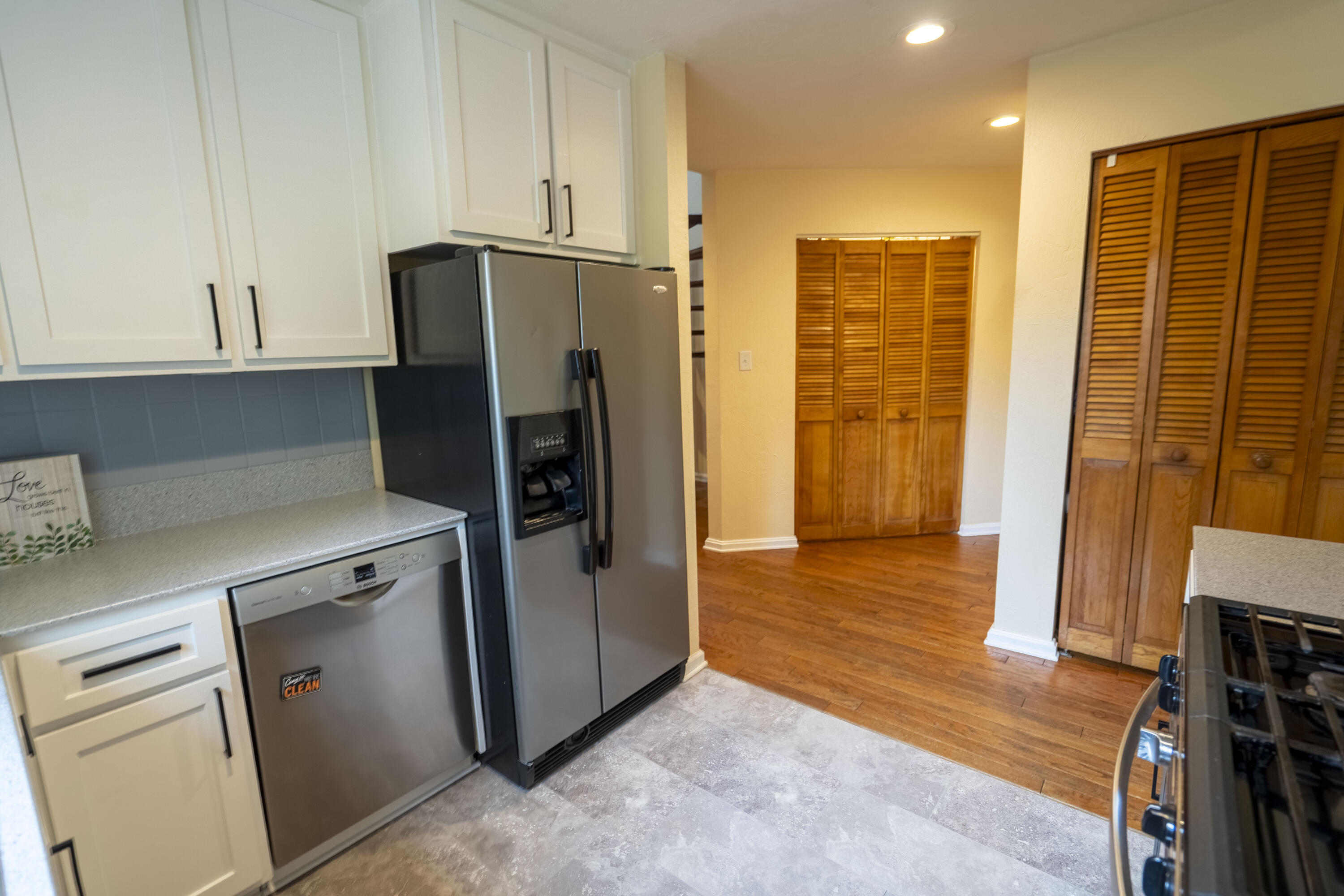 6611 Crooked Creek Road Tallahassee, FL 32311 - Photo 25 of 50 a kitchen with stainless steel appliances a refrigerator and a stove