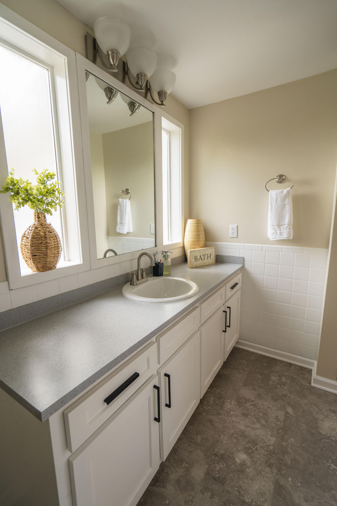 6611 Crooked Creek Road Tallahassee, FL 32311 - Photo 30 of 50 a bathroom with a sink and a window