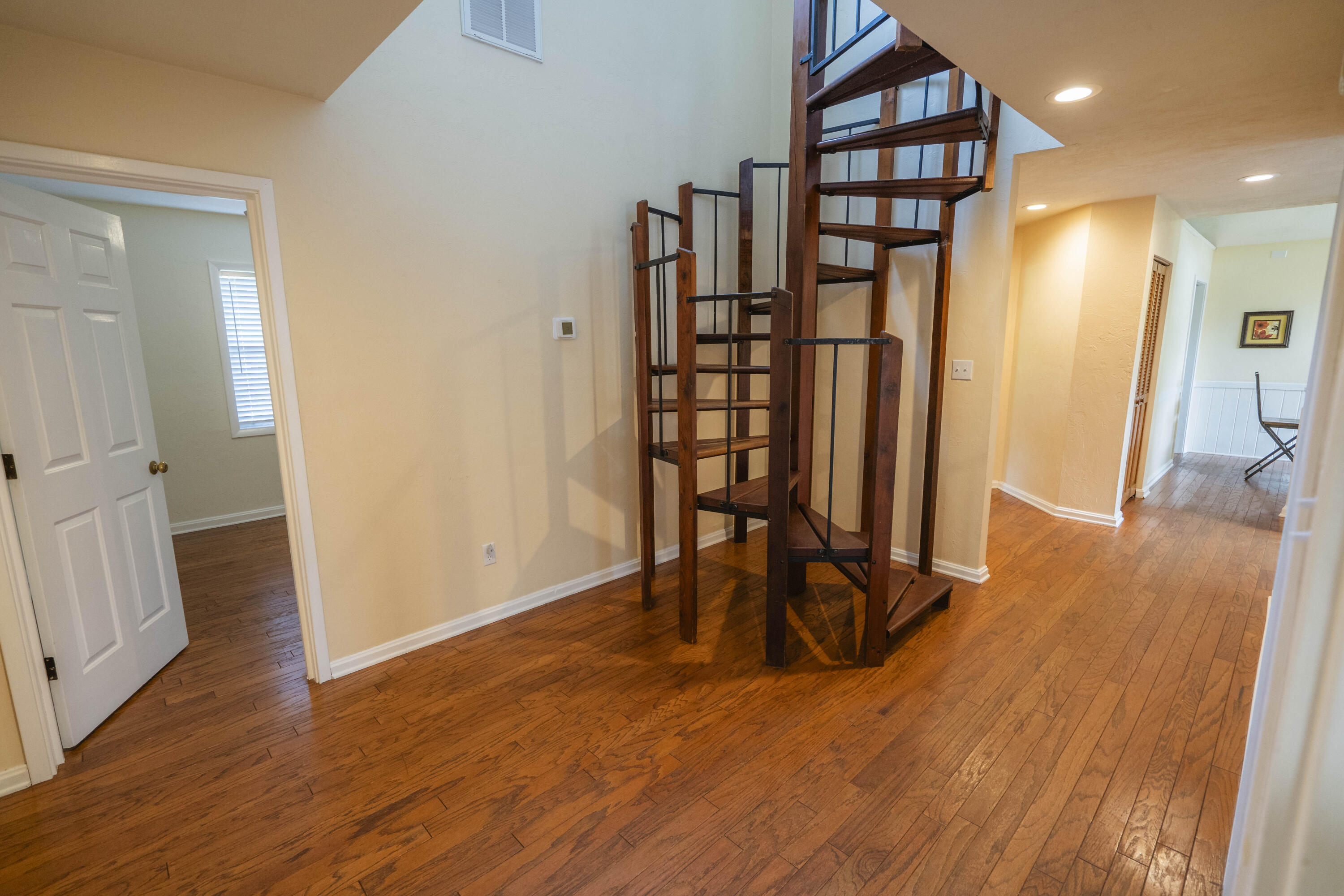 6611 Crooked Creek Road Tallahassee, FL 32311 - Photo 33 of 50 wooden floor in an empty room with a window