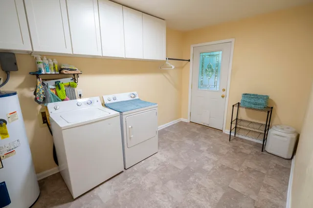 a utility room with dryer and washer