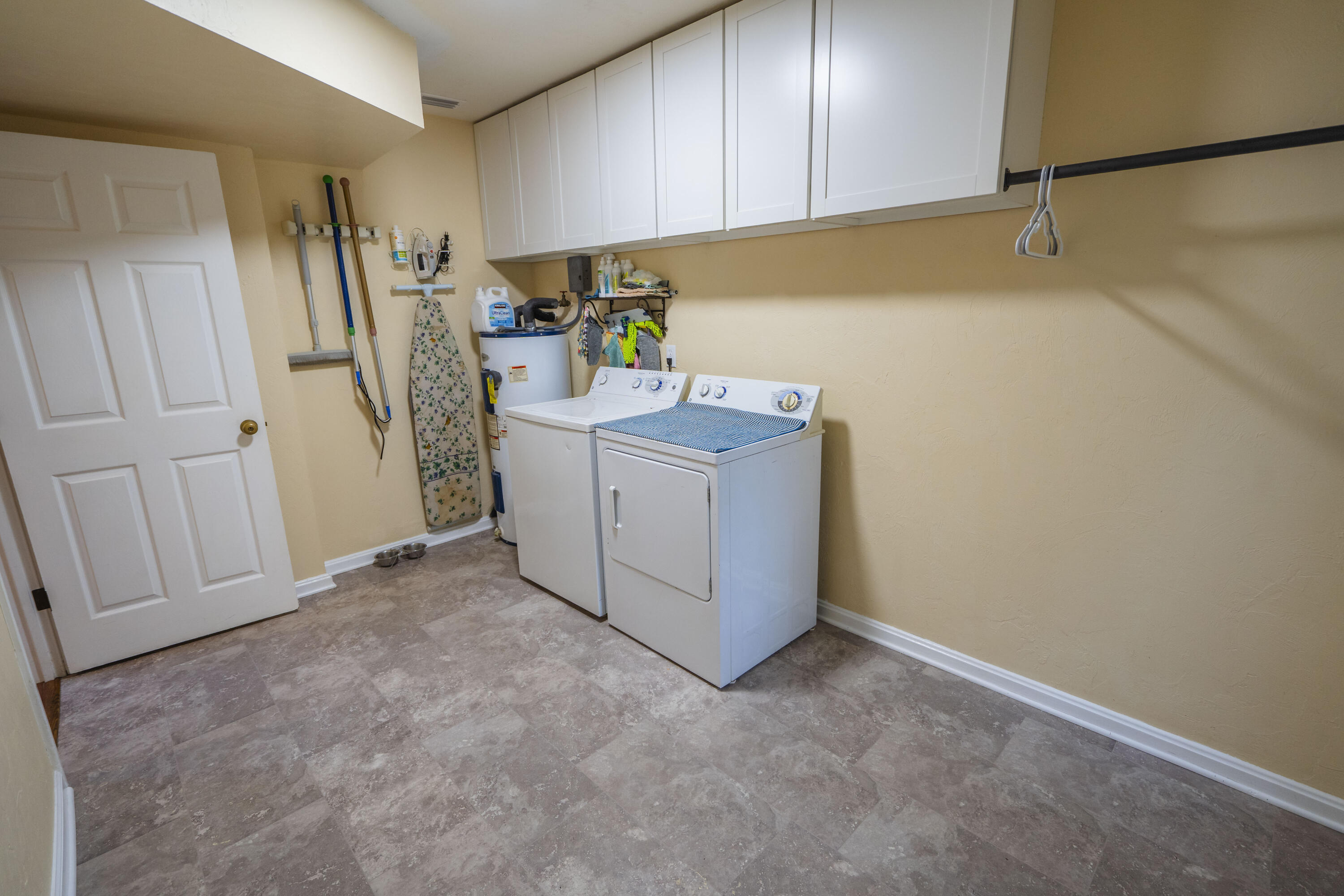 6611 Crooked Creek Road Tallahassee, FL 32311 - Photo 38 of 50 a view of a storage & utility room with a washer dryer