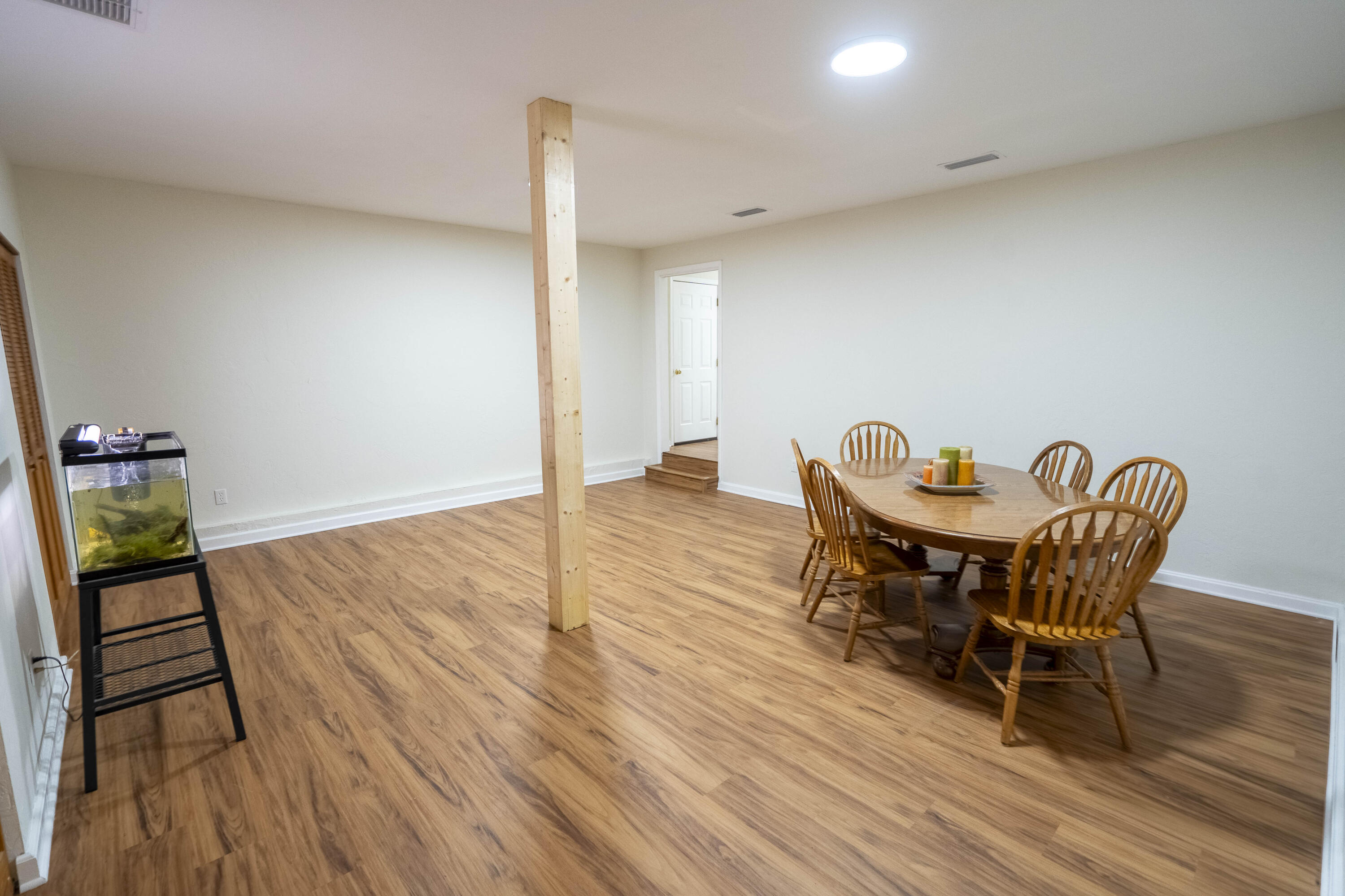 6611 Crooked Creek Road Tallahassee, FL 32311 - Photo 39 of 50 a view of a dining room with furniture and wooden floor