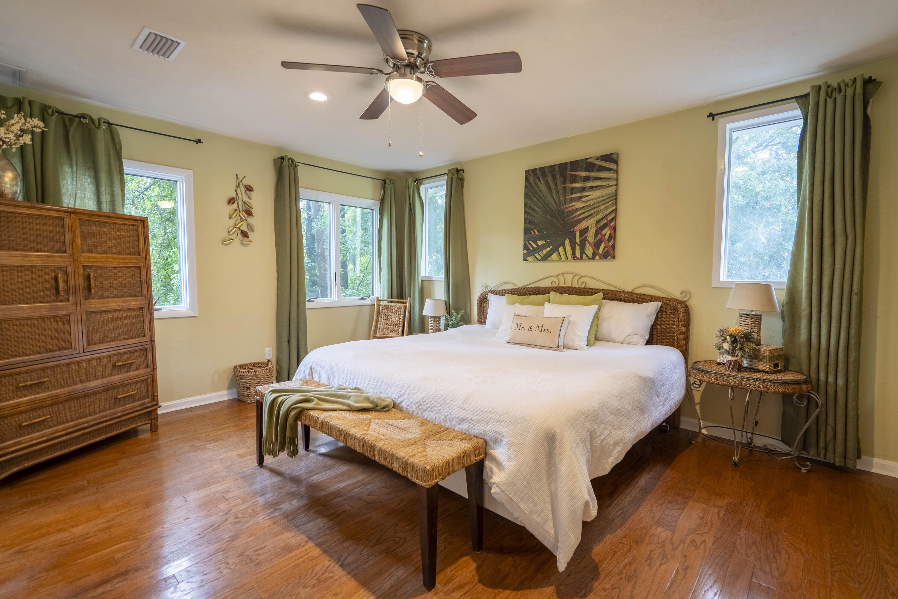 6611 Crooked Creek Road Tallahassee, FL 32311 - Photo 44 of 50 a bedroom with a bed and wooden floor