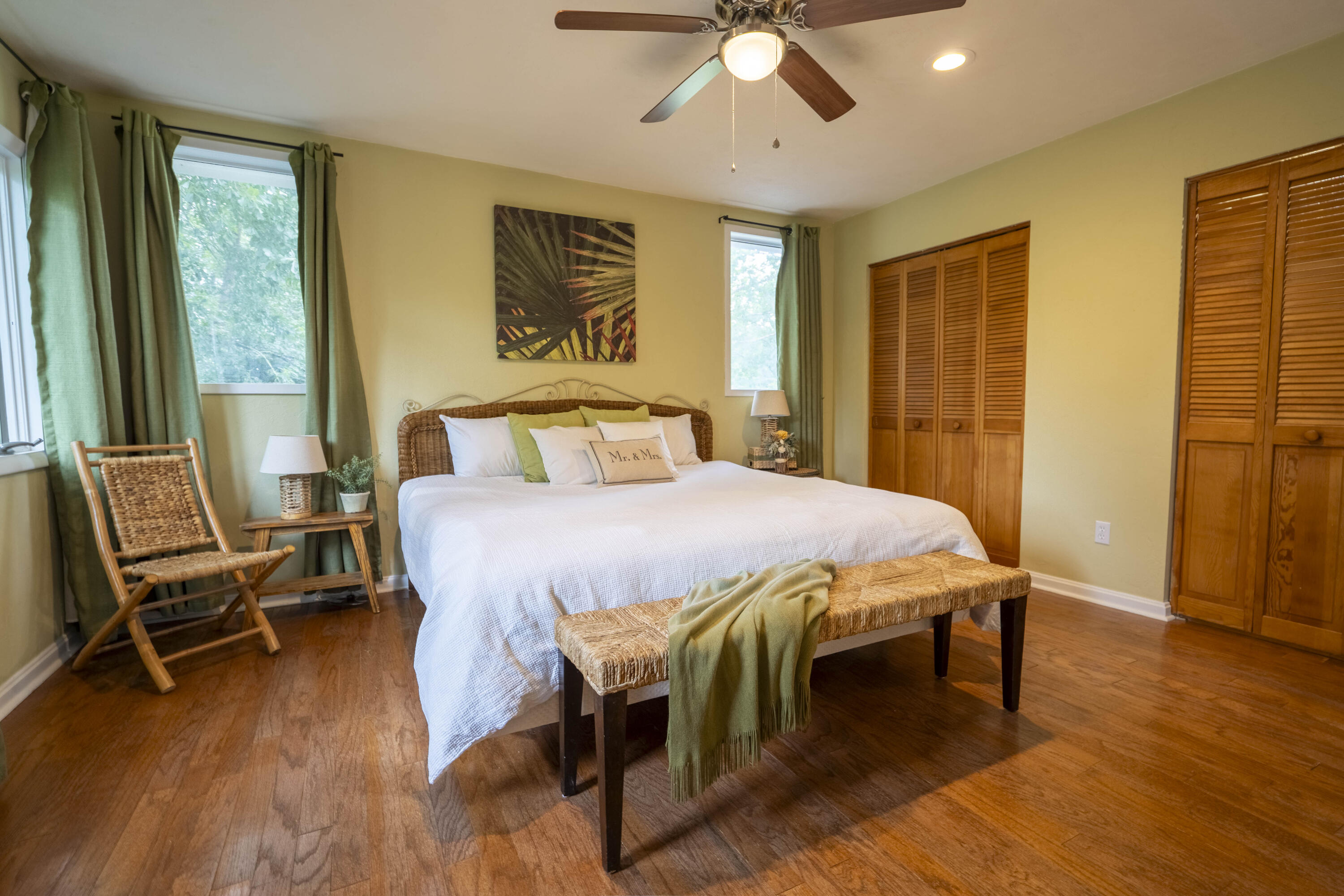 6611 Crooked Creek Road Tallahassee, FL 32311 - Photo 45 of 50 a bedroom with a bed and wooden floor