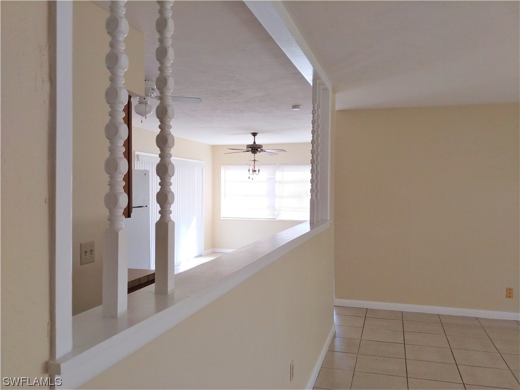 112 Clayton Avenue Lehigh Acres, FL 33936 - Photo 6 of 16 view of an empty room and a window