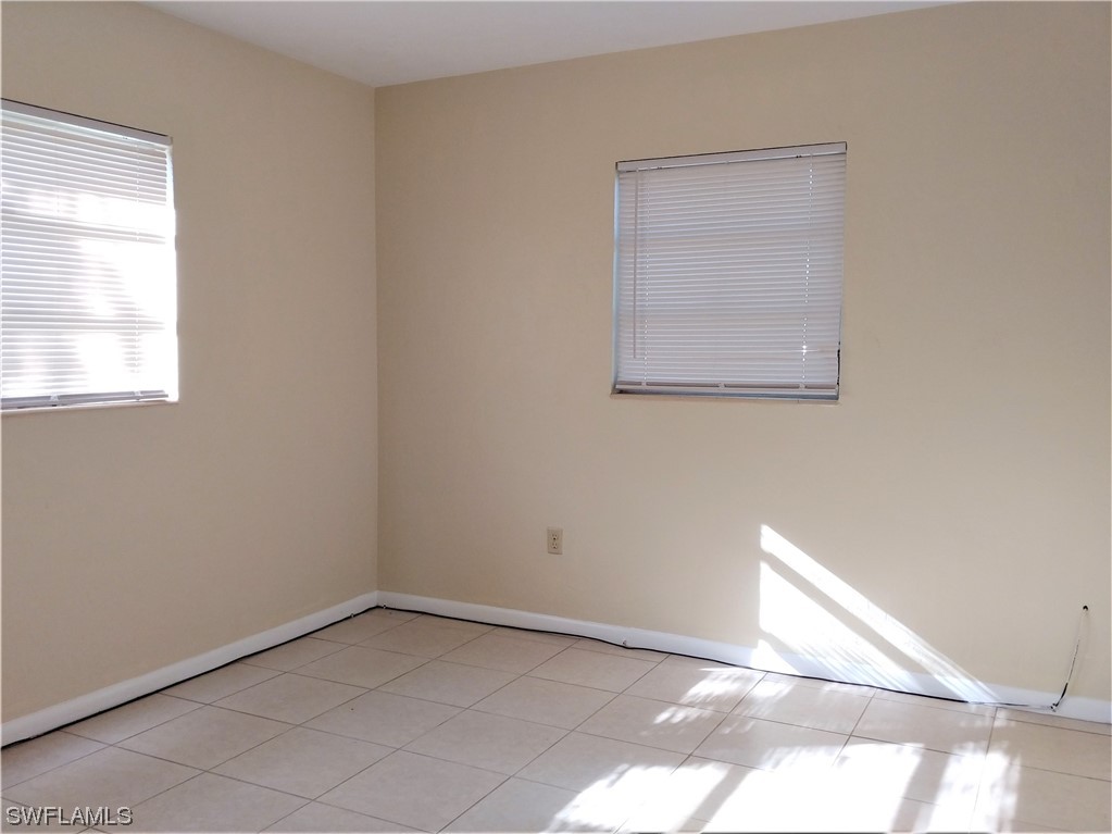 112 Clayton Avenue Lehigh Acres, FL 33936 - Photo 9 of 16 a view of an empty room