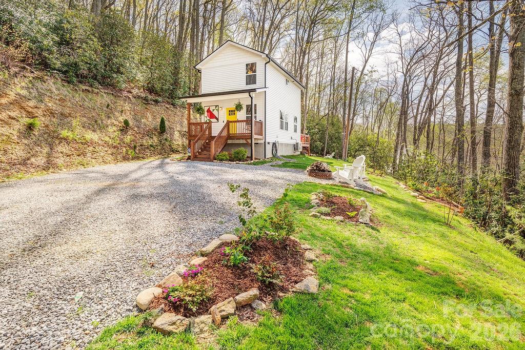 343 Garren Creek Road Fairview, NC 28730 - Photo 28 of 30 a view of outdoor space yard and patio