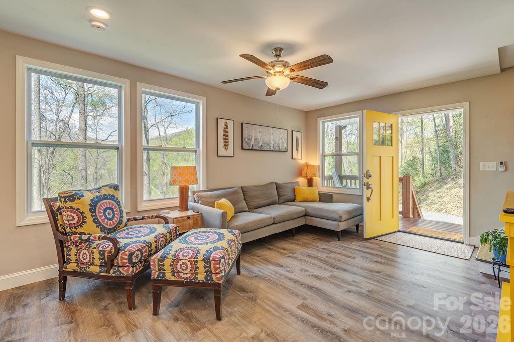 343 Garren Creek Road Fairview, NC 28730 - Photo 4 of 30 a living room with furniture and a large window