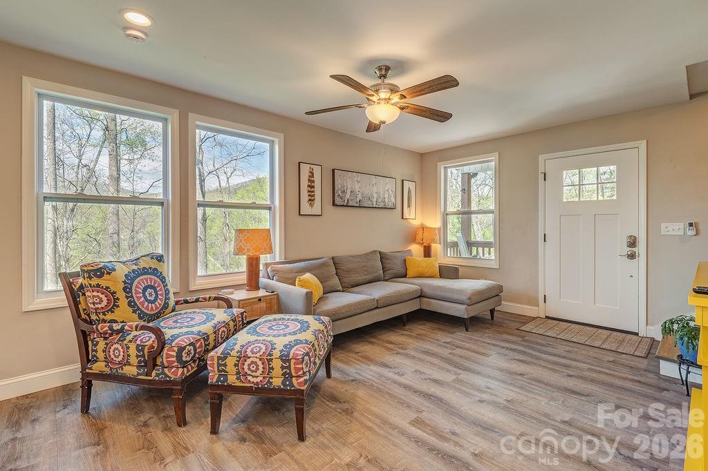 343 Garren Creek Road Fairview, NC 28730 - Photo 6 of 30 a living room with furniture and a large window
