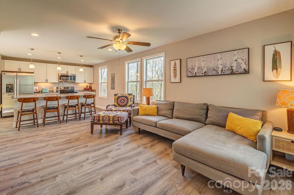 343 Garren Creek Road Fairview, NC 28730 - Photo 10 of 30 a living room with furniture and a large window