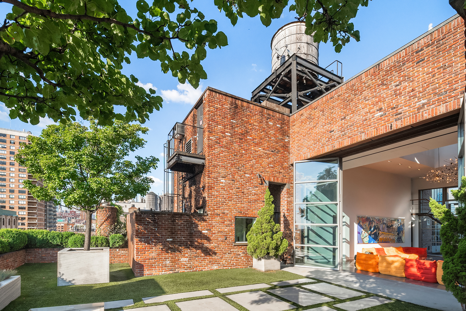 a picture of a table and chairs with potted plants