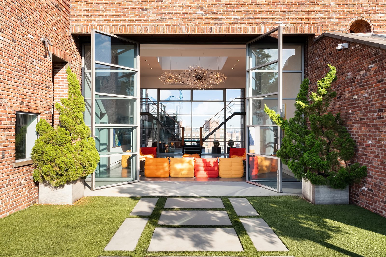 704 Broadway, Unit PH Manhattan, NY 10003 - Photo 3 of 30 front view of a house with a yard