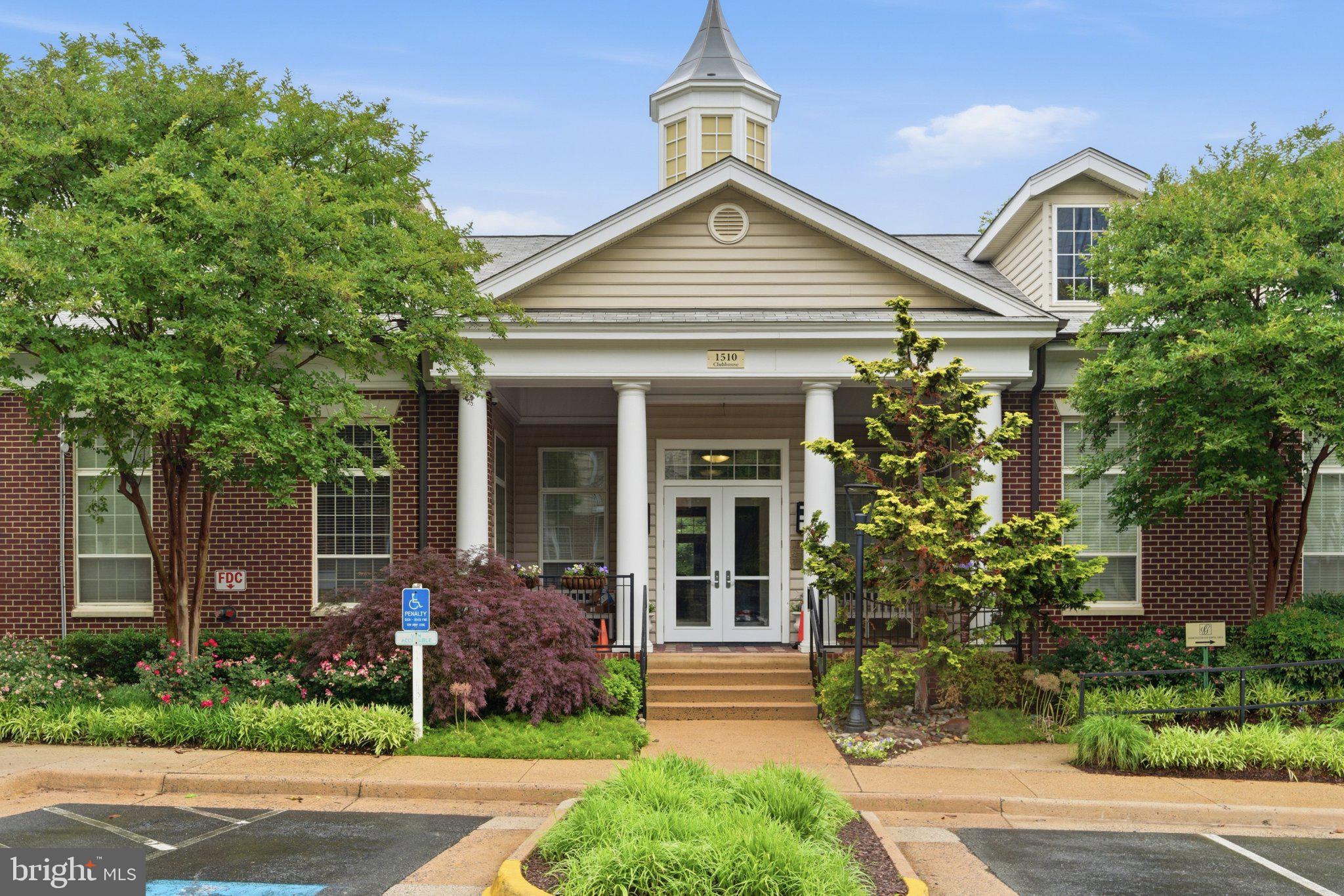 1580 Spring Gate Dr., Unit 4303 McLean, VA 22102 - Photo 37 of 41 Charming entrance with lush landscaping.