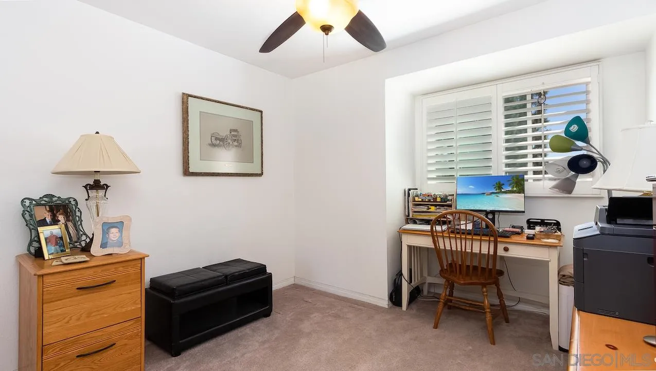 14140 Carmel Ridge Road San Diego, CA 92128 - Photo 14 of 17 a view of a workspace with furniture and a window
