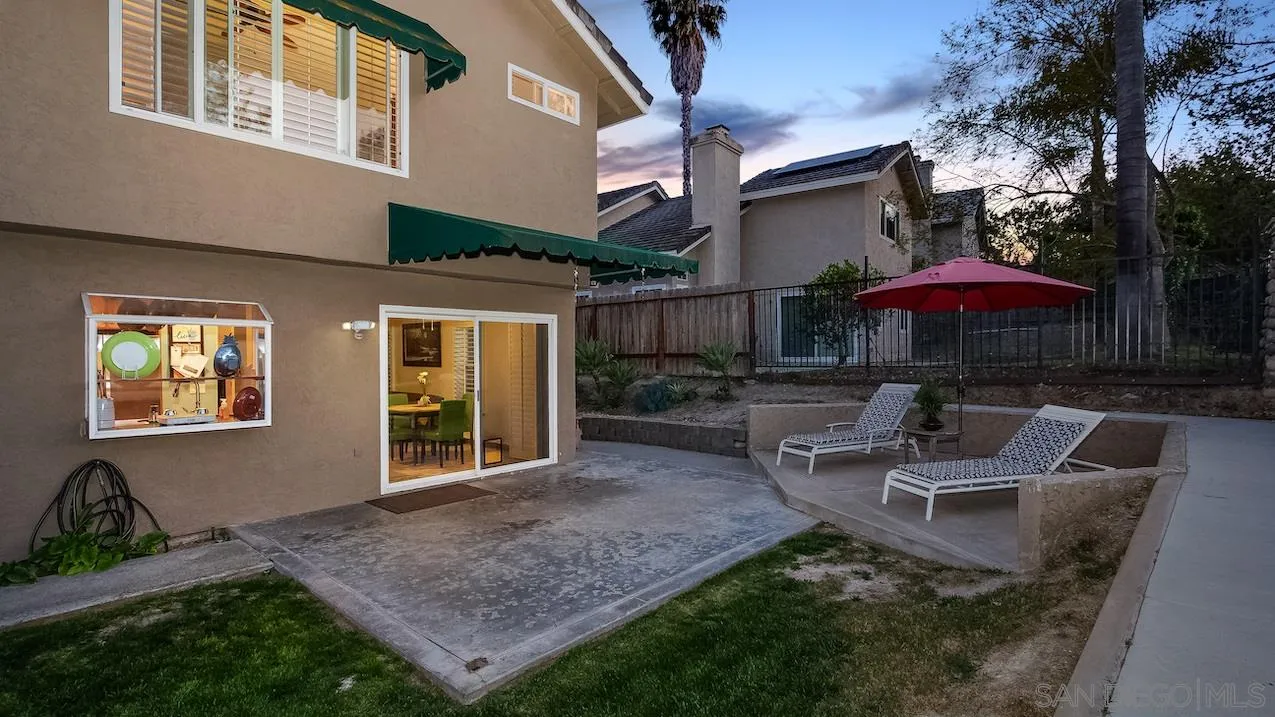 14140 Carmel Ridge Road San Diego, CA 92128 - Photo 15 of 17 a view of a house with backyard and sitting area