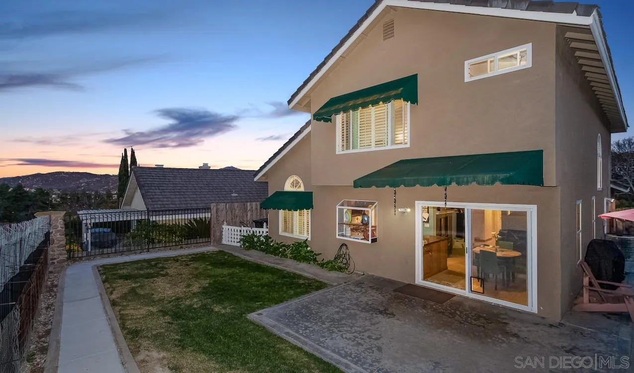14140 Carmel Ridge Road San Diego, CA 92128 - Photo 17 of 17 a front view of a house with a yard