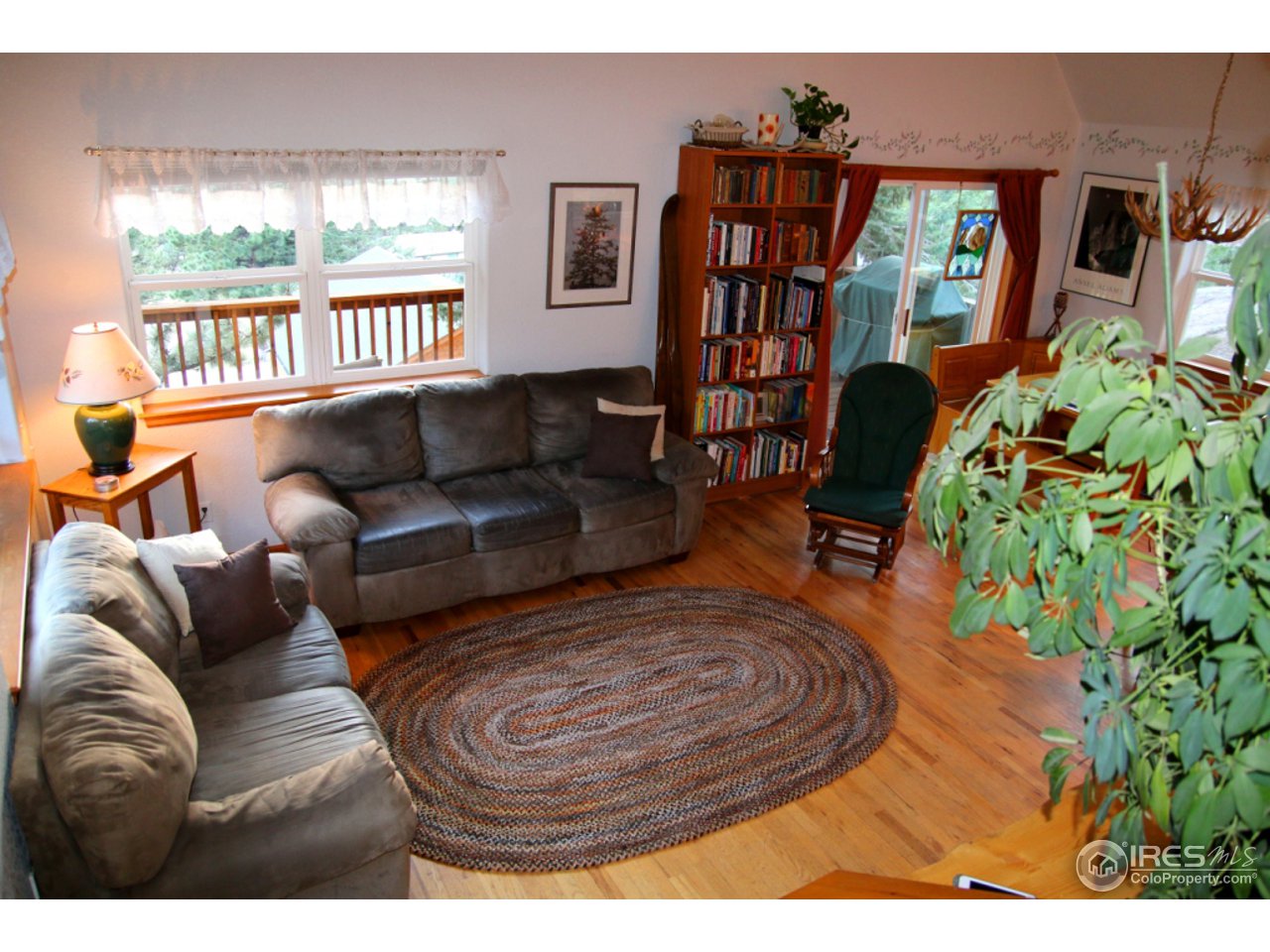 164 Button Rock Road Lyons, CO 80540 - Photo 13 of 23 a living room with furniture and a window