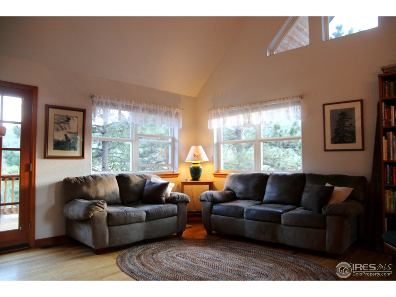 164 Button Rock Road Lyons, CO 80540 - Photo 14 of 23 a living room with furniture and a large window