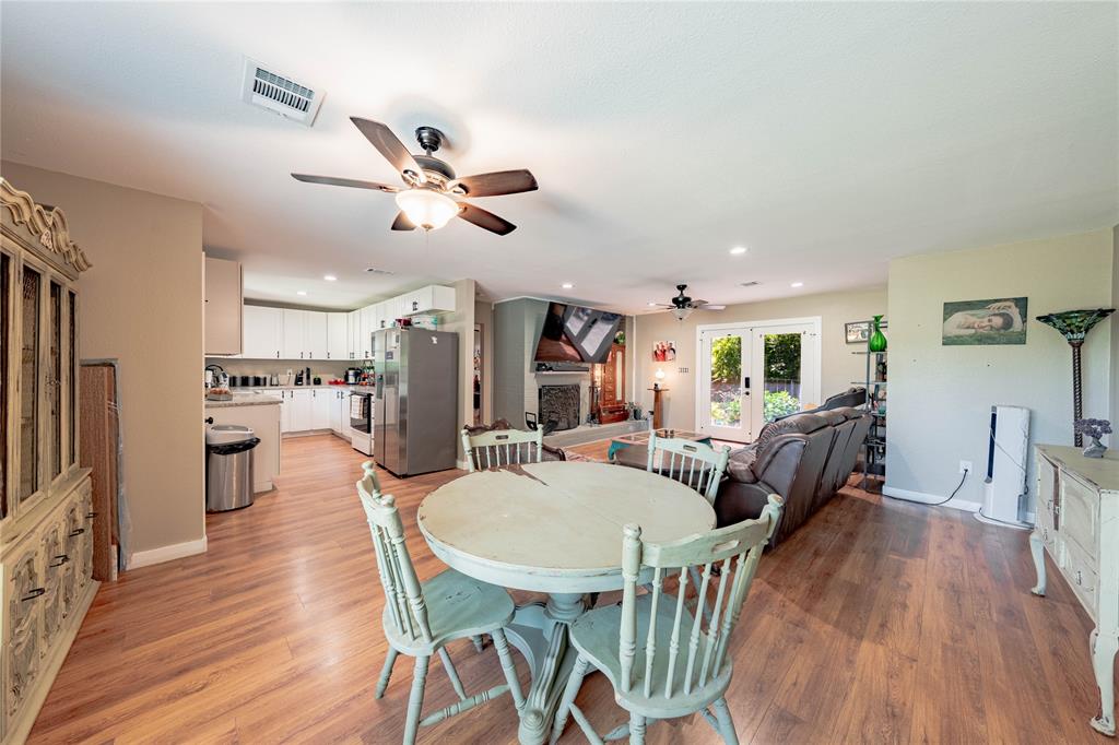 603 Mosley Road Athens, TX 75751 - Photo 3 of 15 a view of a dining room with furniture window and wooden floor