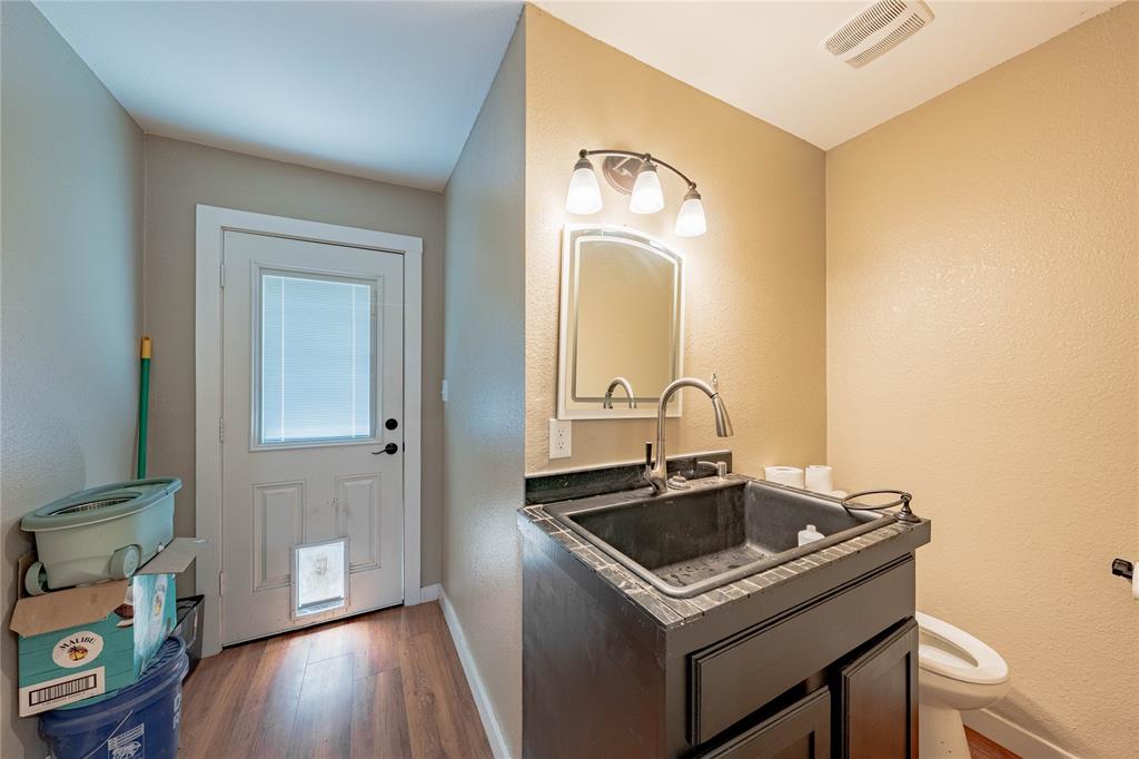 603 Mosley Road Athens, TX 75751 - Photo 7 of 15 a bathroom with a sink and a mirror