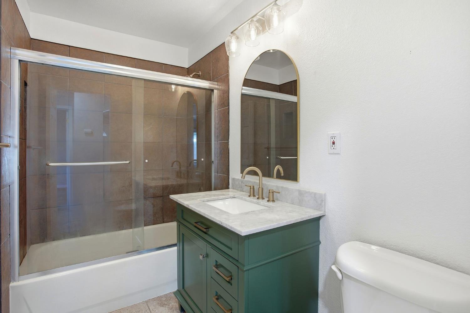 4617 Robertson Avenue Sacramento, CA 95821 - Photo 26 of 37 The bathroom has been tastefully updated...shower over tub.