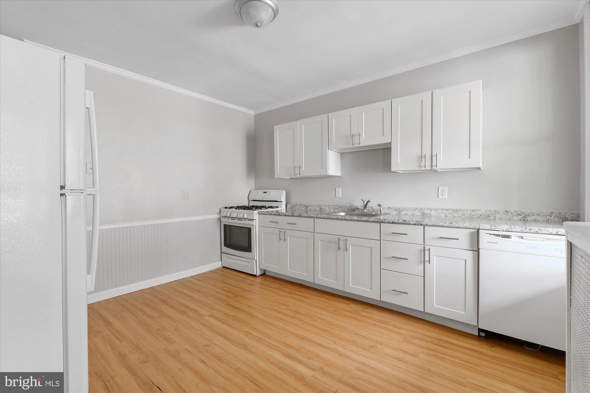 3660 Keswick Road Baltimore, MD 21211 - Photo 3 of 23 Updated kitchen & walkout to backyard from kit