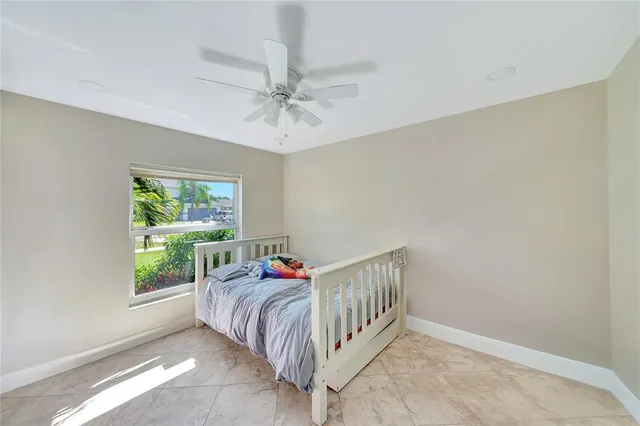 a view of entryway with window and wooden floor