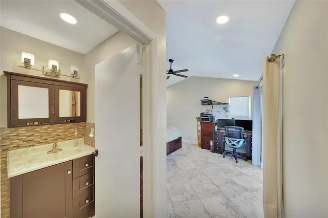 a view of kitchen and kitchen island