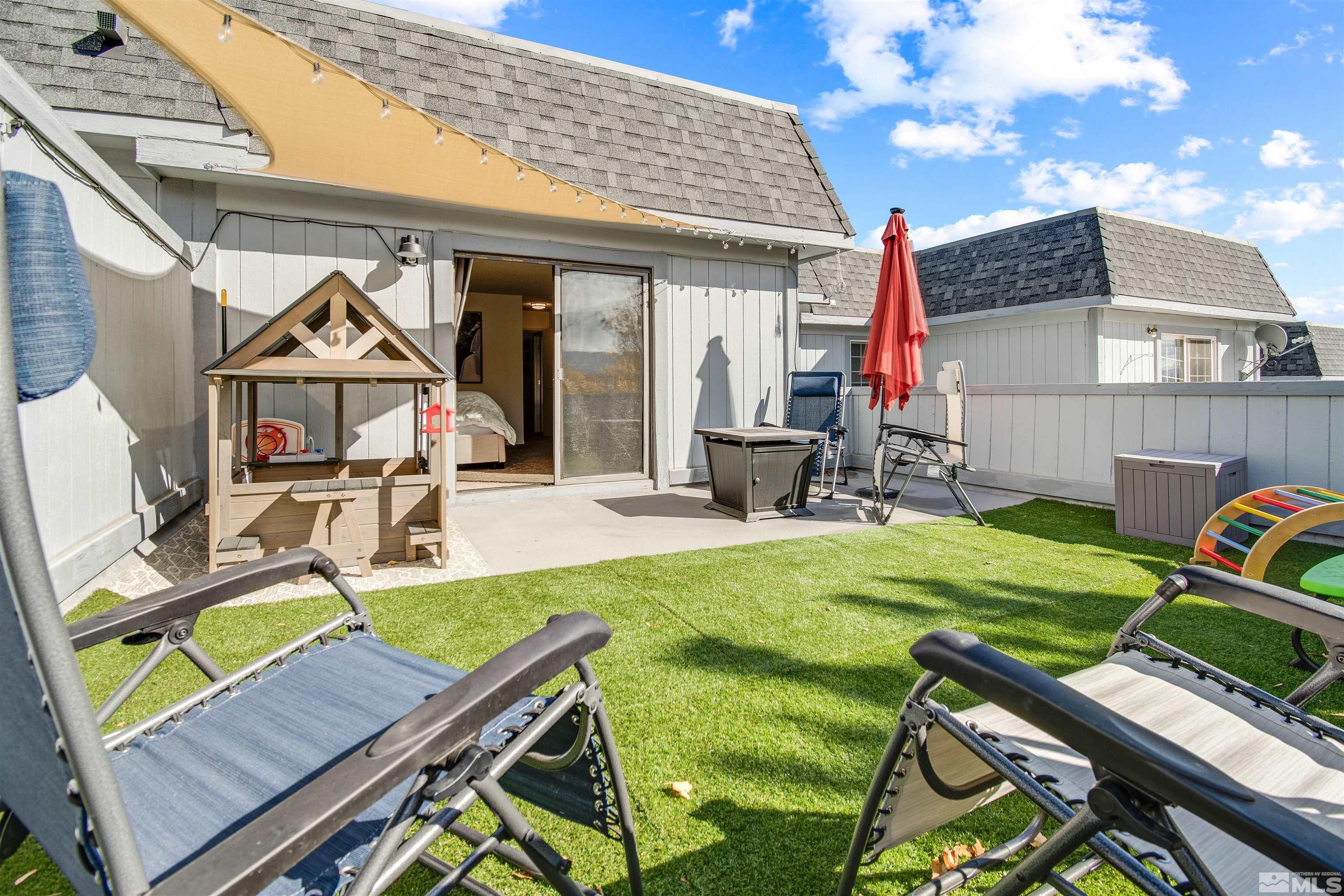 3961 Kings Row Reno, NV 89503 - Photo 20 of 25 a view of a house with backyard porch and sitting area