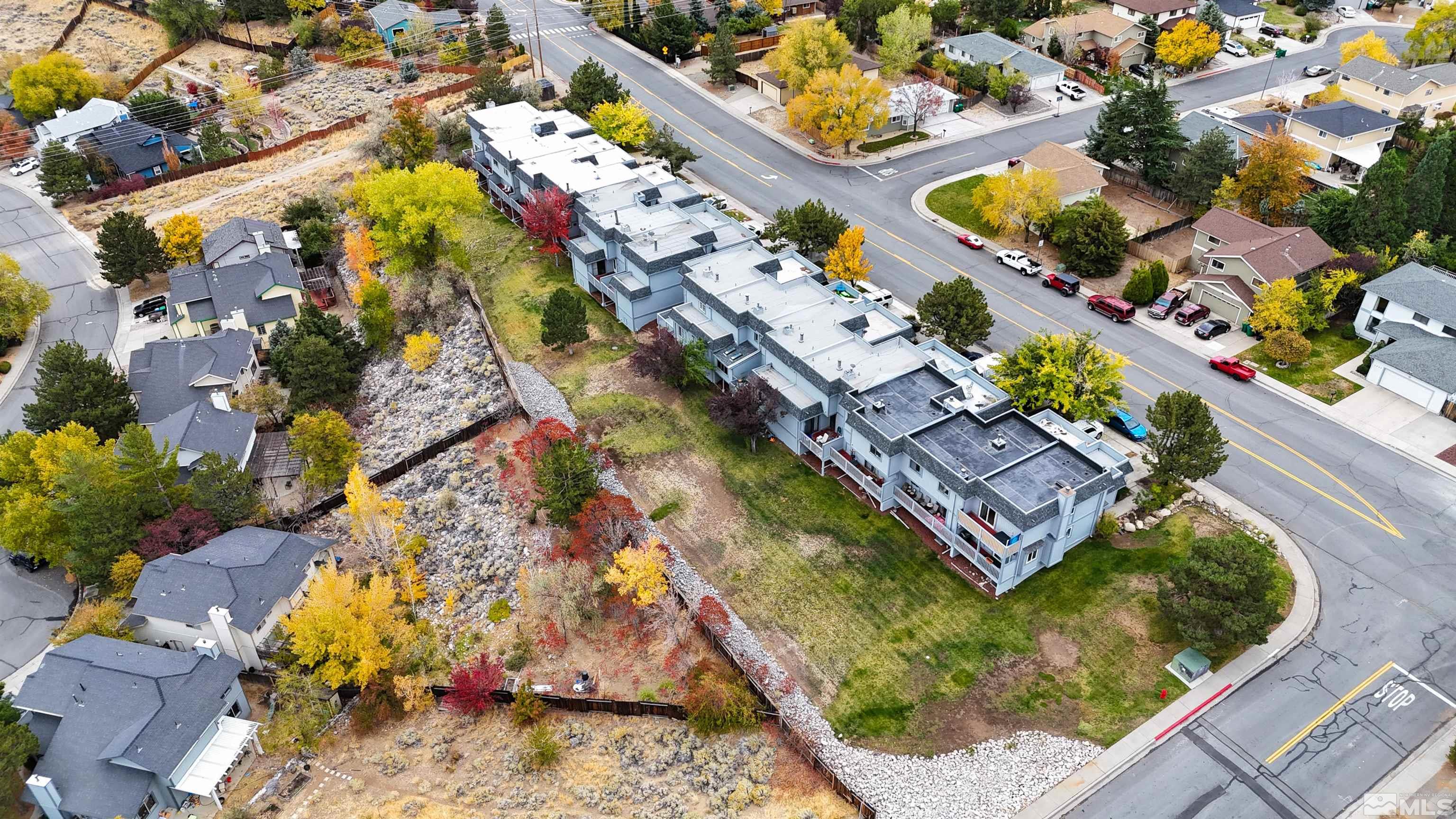 3961 Kings Row Reno, NV 89503 - Photo 24 of 25 a aerial view of a house with a yard and garden