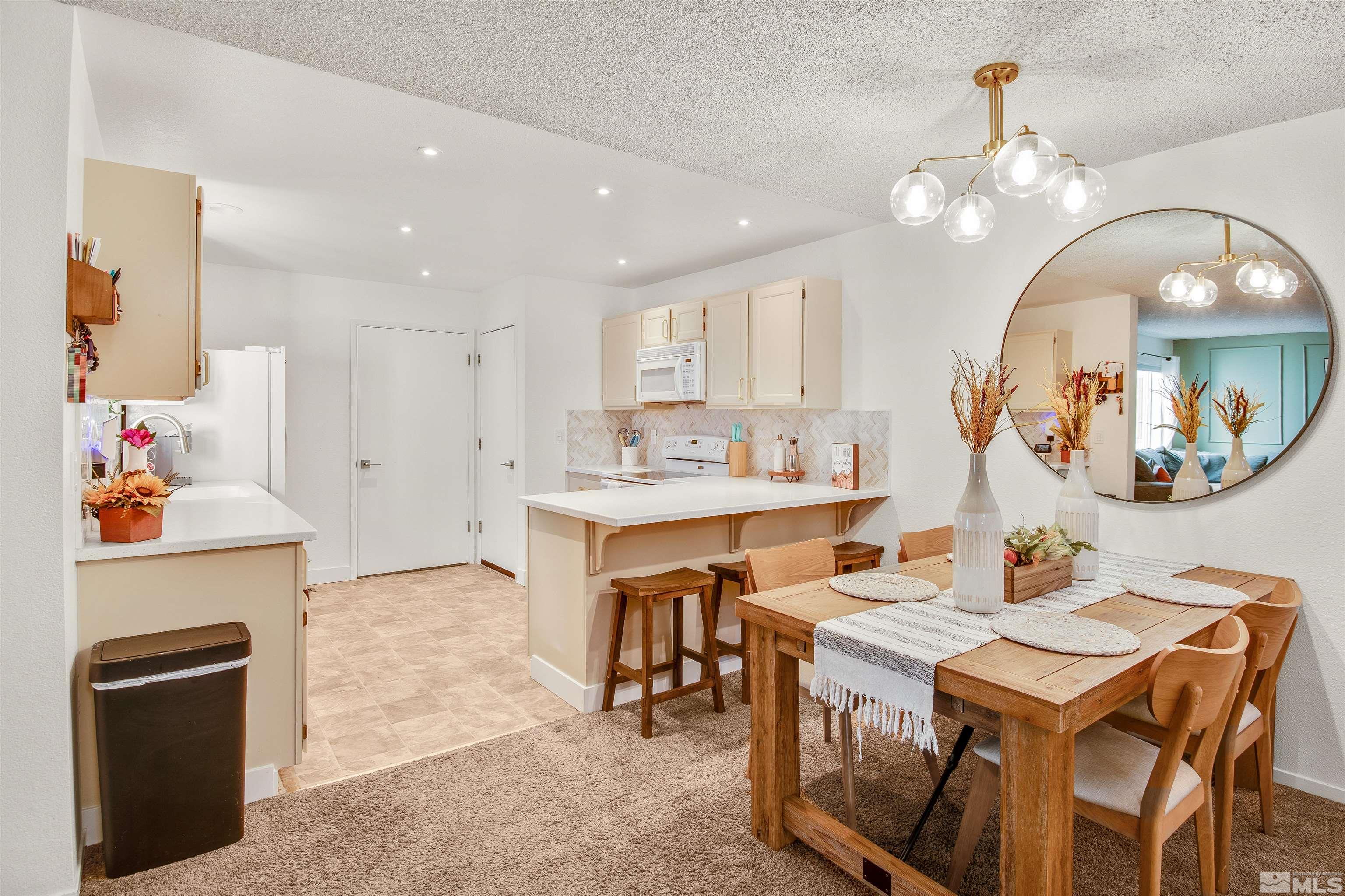 3961 Kings Row Reno, NV 89503 - Photo 6 of 25 a very nice looking dining room with a table and chairs