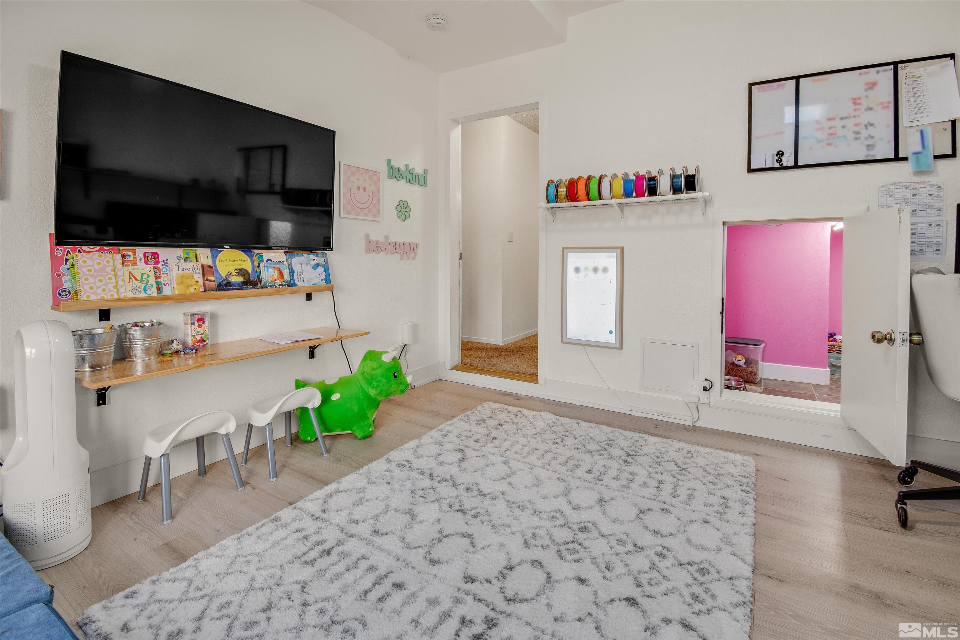 3961 Kings Row Reno, NV 89503 - Photo 9 of 25 a living room with furniture and a flat screen tv