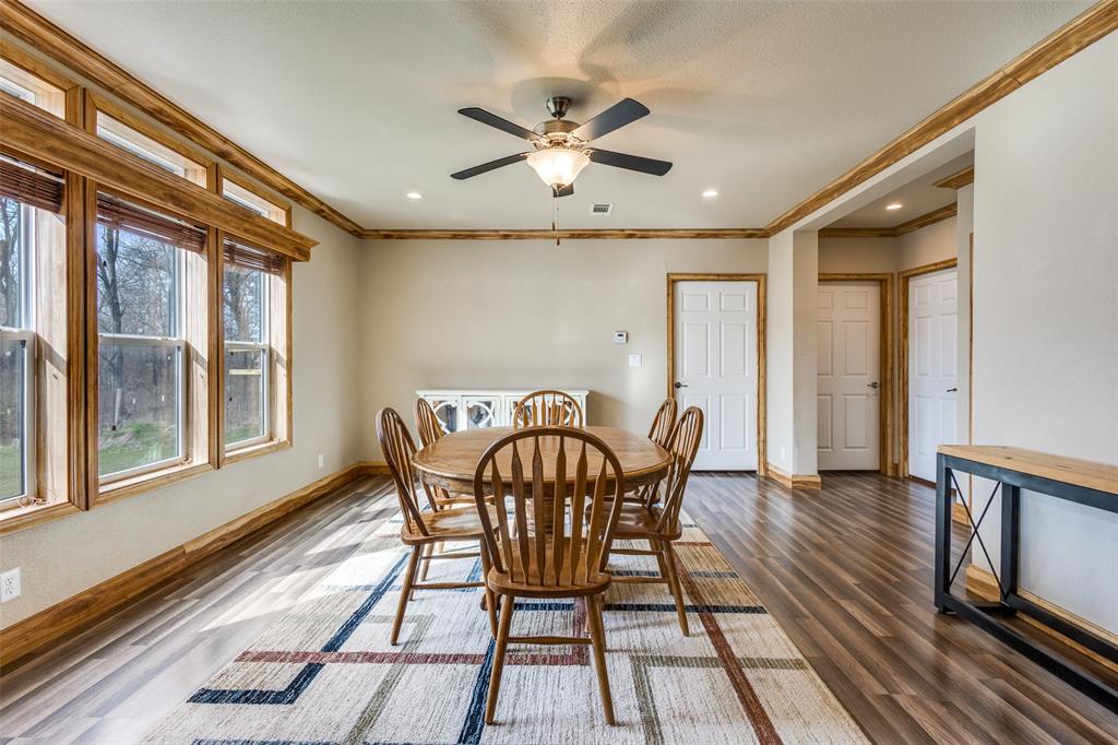 1425 Cowan Road Weston, TX 75009 - Photo 13 of 27 Dining room with crown molding and a ceiling fan.