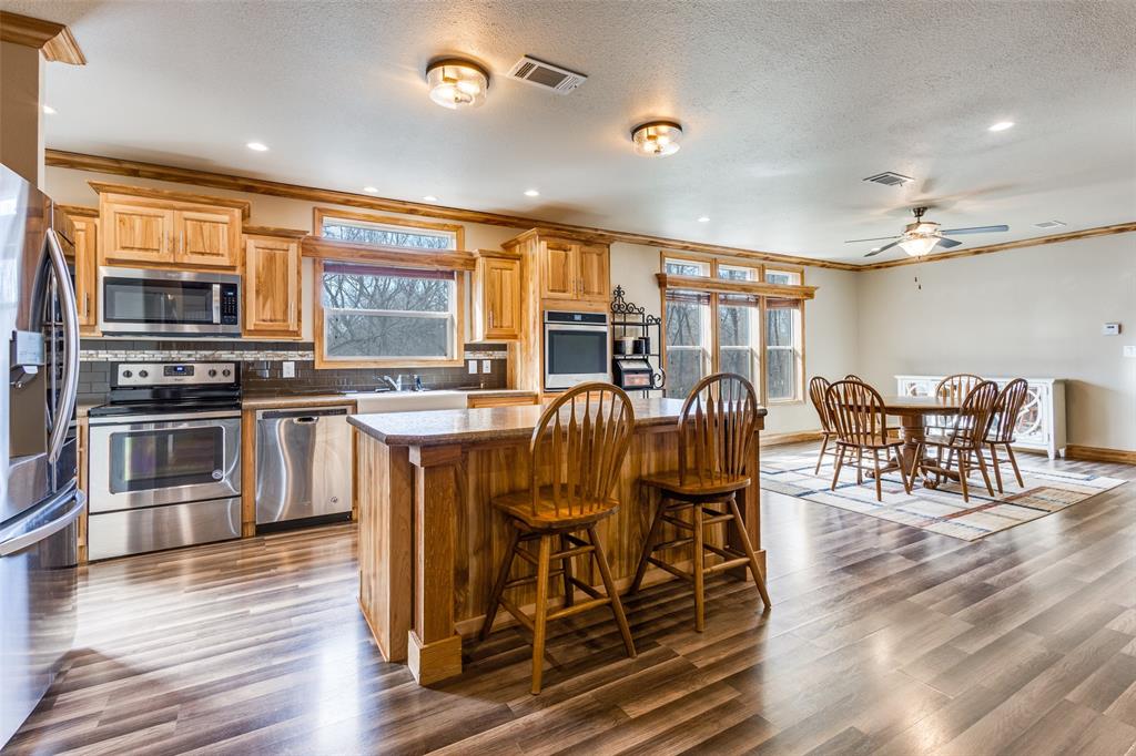 1425 Cowan Road Weston, TX 75009 - Photo 10 of 27 Kitchen open to breakfast room and family room