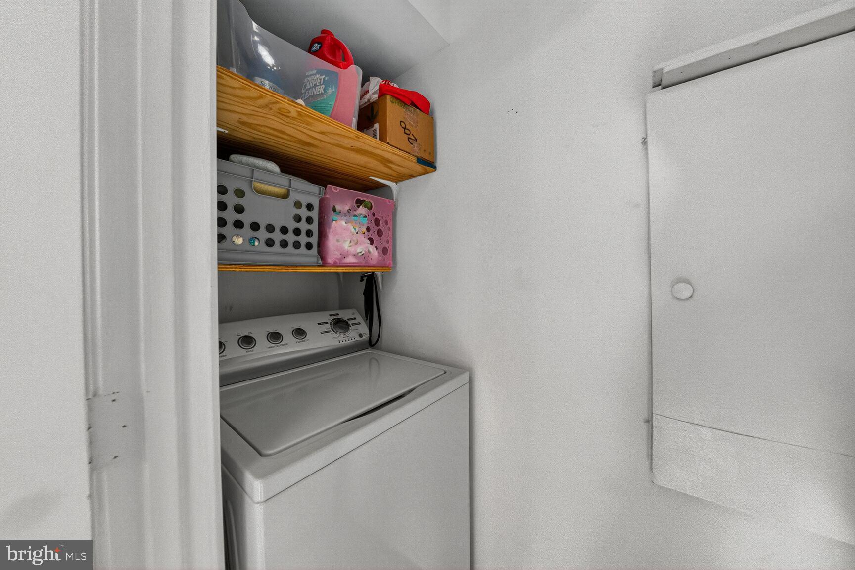 14901 McKisson Court, Unit 7CC Silver Spring, MD 20906 - Photo 11 of 34 a utility room with dryer and washer