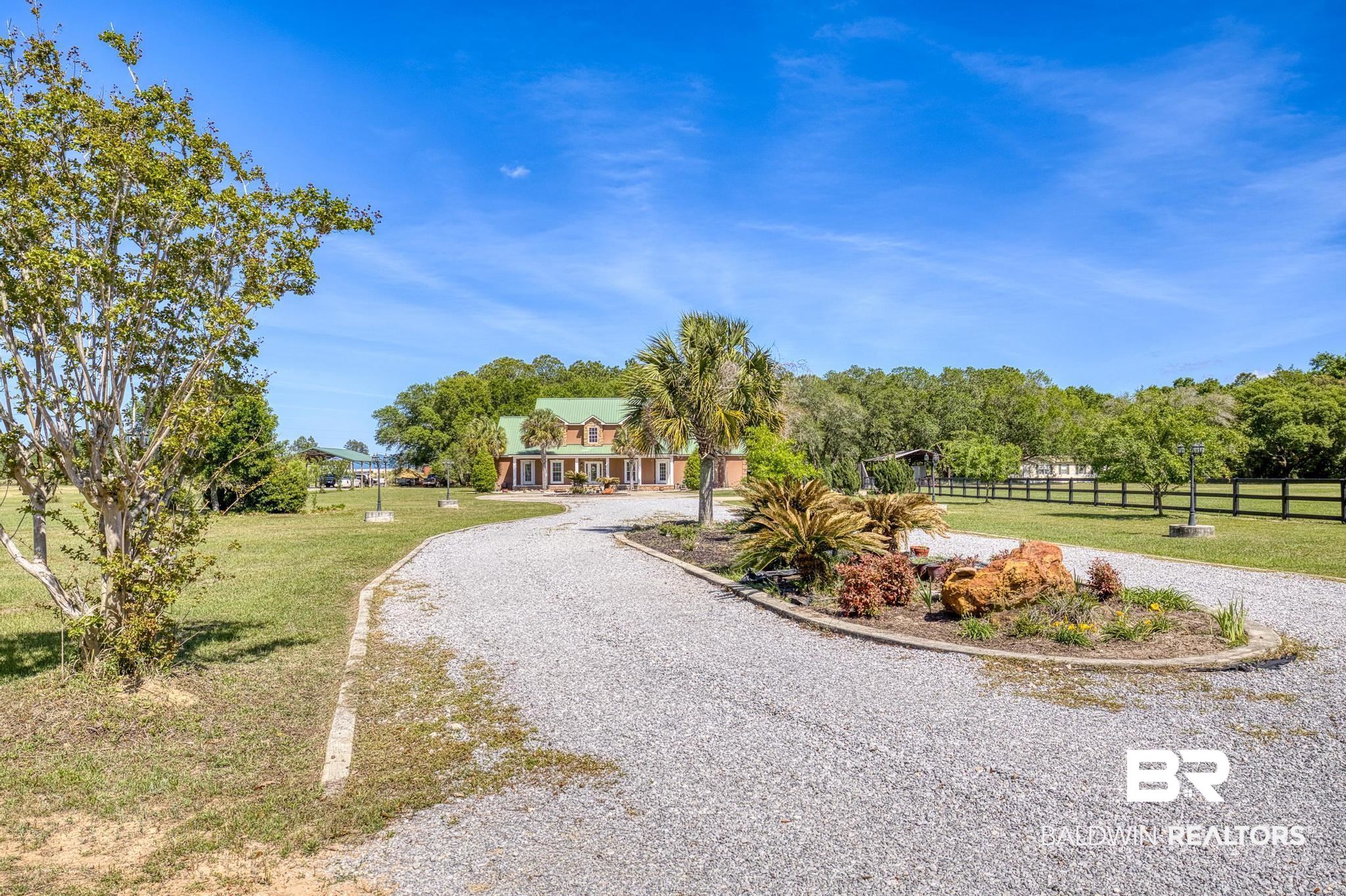 32875 Faircloth Road Lillian, AL 36549 - Photo 10 of 85 View of dirt / gravel road with view of scattered trees