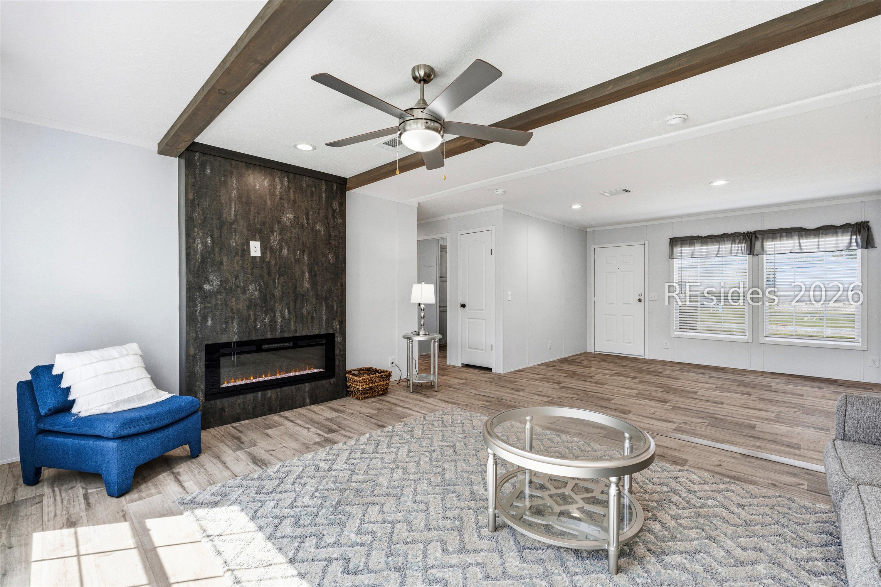 22 Unity Lane Seabrook, SC 29940 - Photo 6 of 24 Fireplace in living room