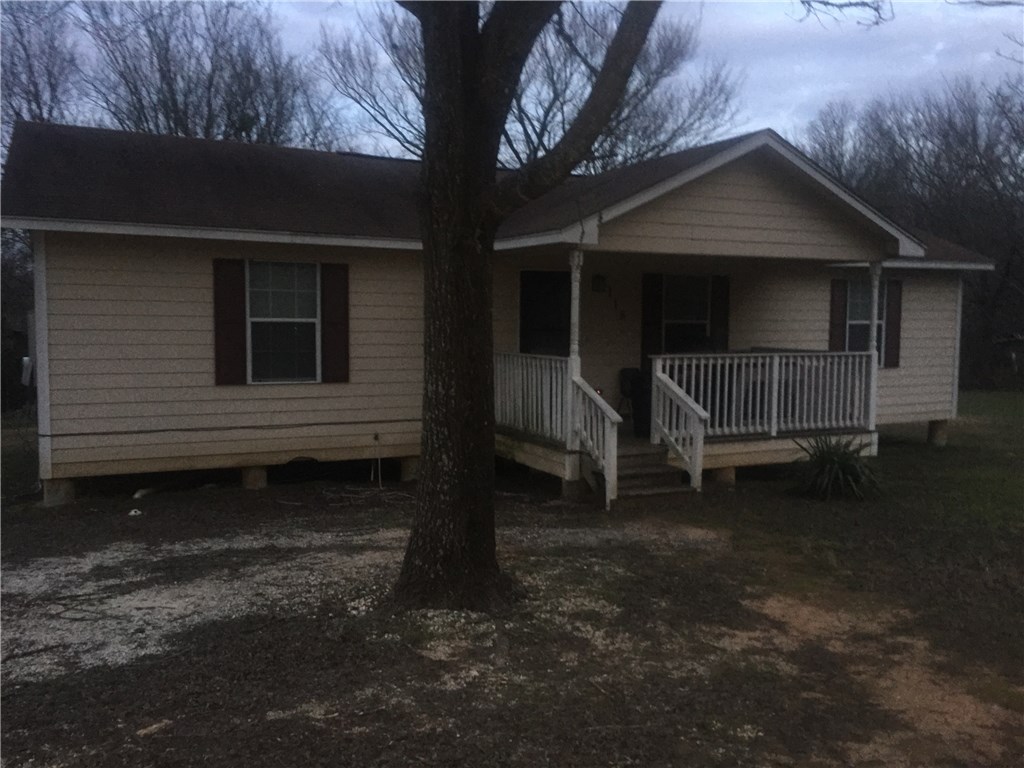 a house with yard in front of it