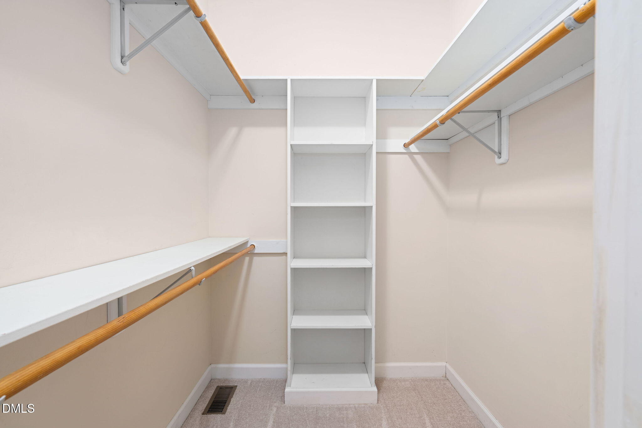 9916 Bonsal Crossing Road New Hill, NC 27562 - Photo 32 of 80 a view of an empty walk in closet